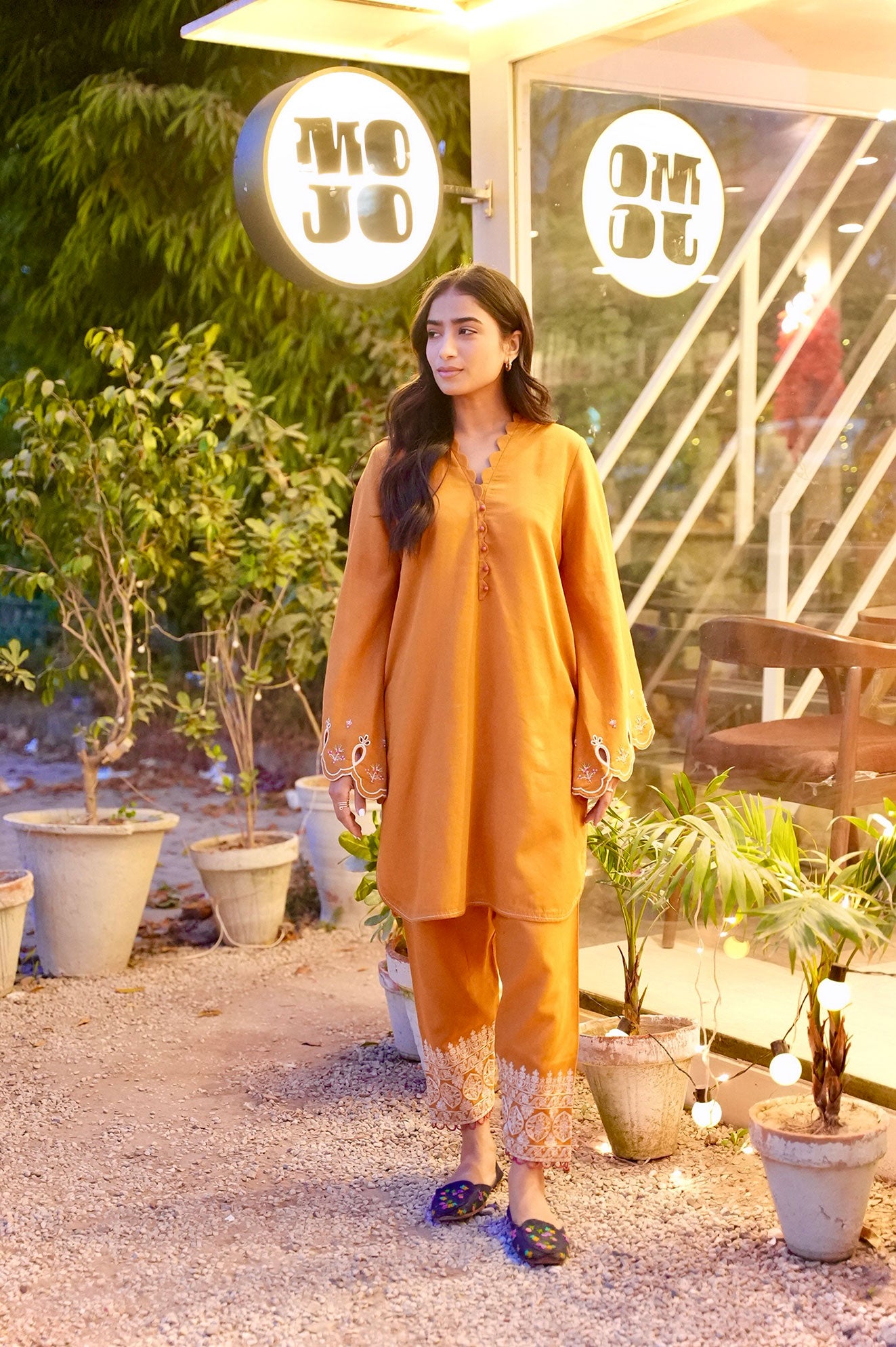 FW25DC-2881 Mustard 2-piece karandi ensemble with white and orange embroidery and scalloped neckline.