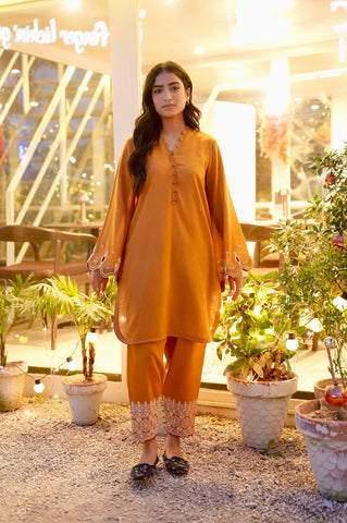 FW25DC-2881 Mustard 2-piece karandi ensemble with white and orange embroidery and scalloped neckline.
