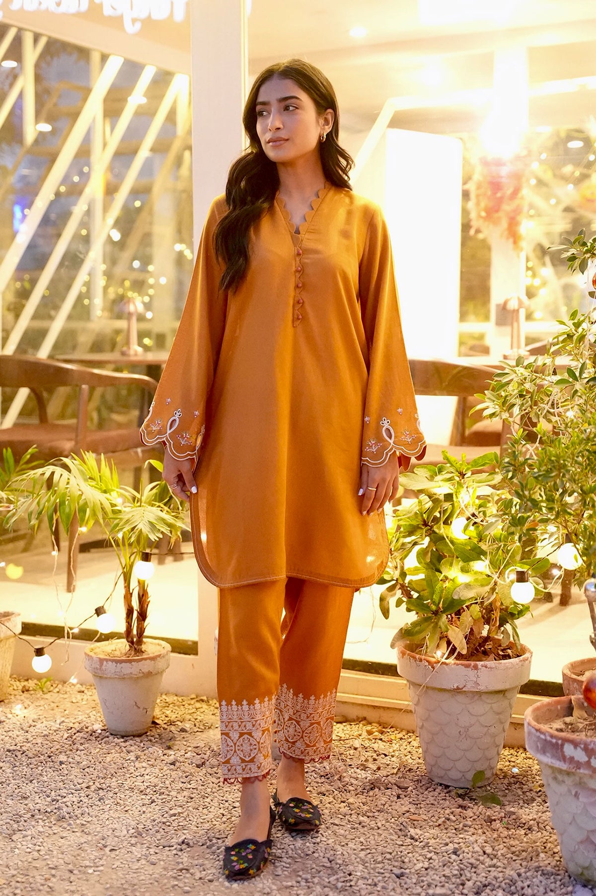 FW25DC-2881 Mustard 2-piece karandi ensemble with white and orange embroidery and scalloped neckline.
