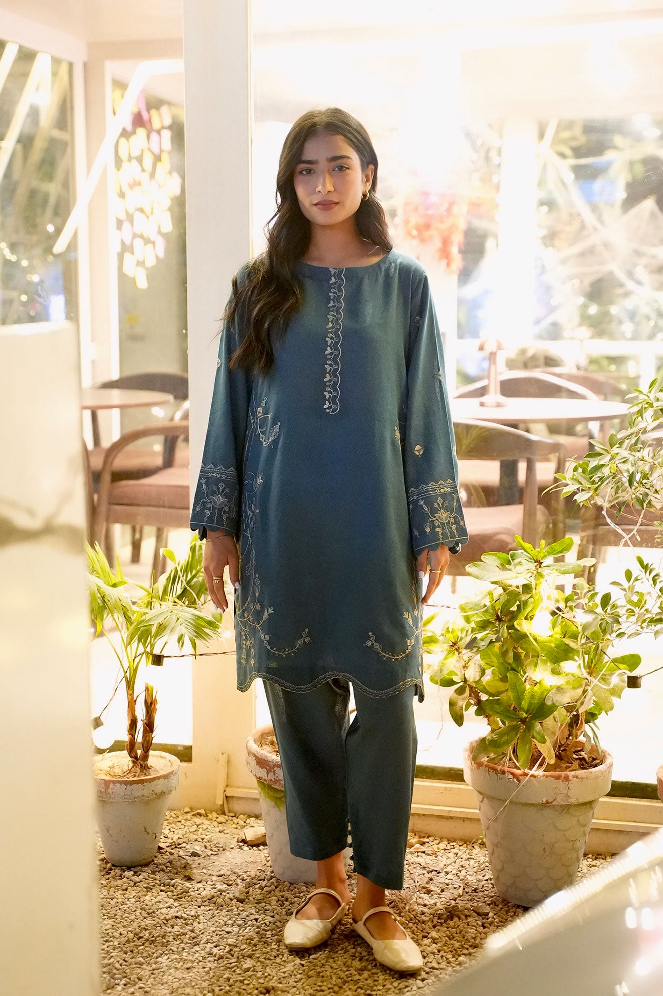 FW25DC-2884 Turquoise blue 2-piece ensemble with tonal embroidery on neckline, sleeves, and hem.