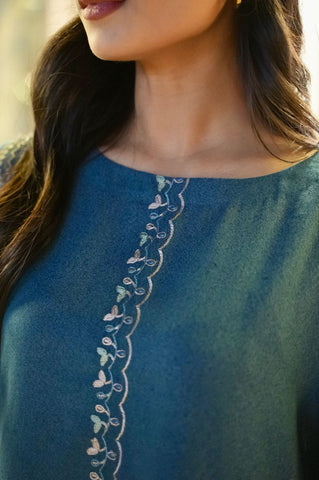 FW25DC-2884 Turquoise blue 2-piece ensemble with tonal embroidery on neckline, sleeves, and hem.