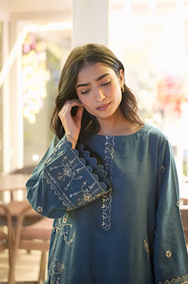 FW25DC-2884 Turquoise blue 2-piece ensemble with tonal embroidery on neckline, sleeves, and hem.