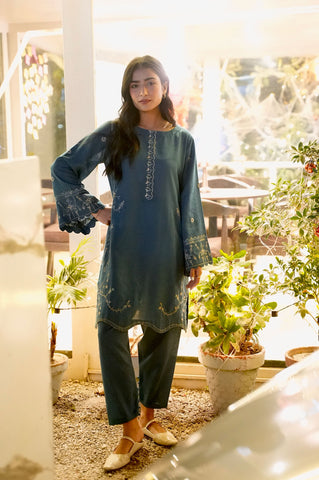 FW25DC-2884 Turquoise blue 2-piece ensemble with tonal embroidery on neckline, sleeves, and hem.