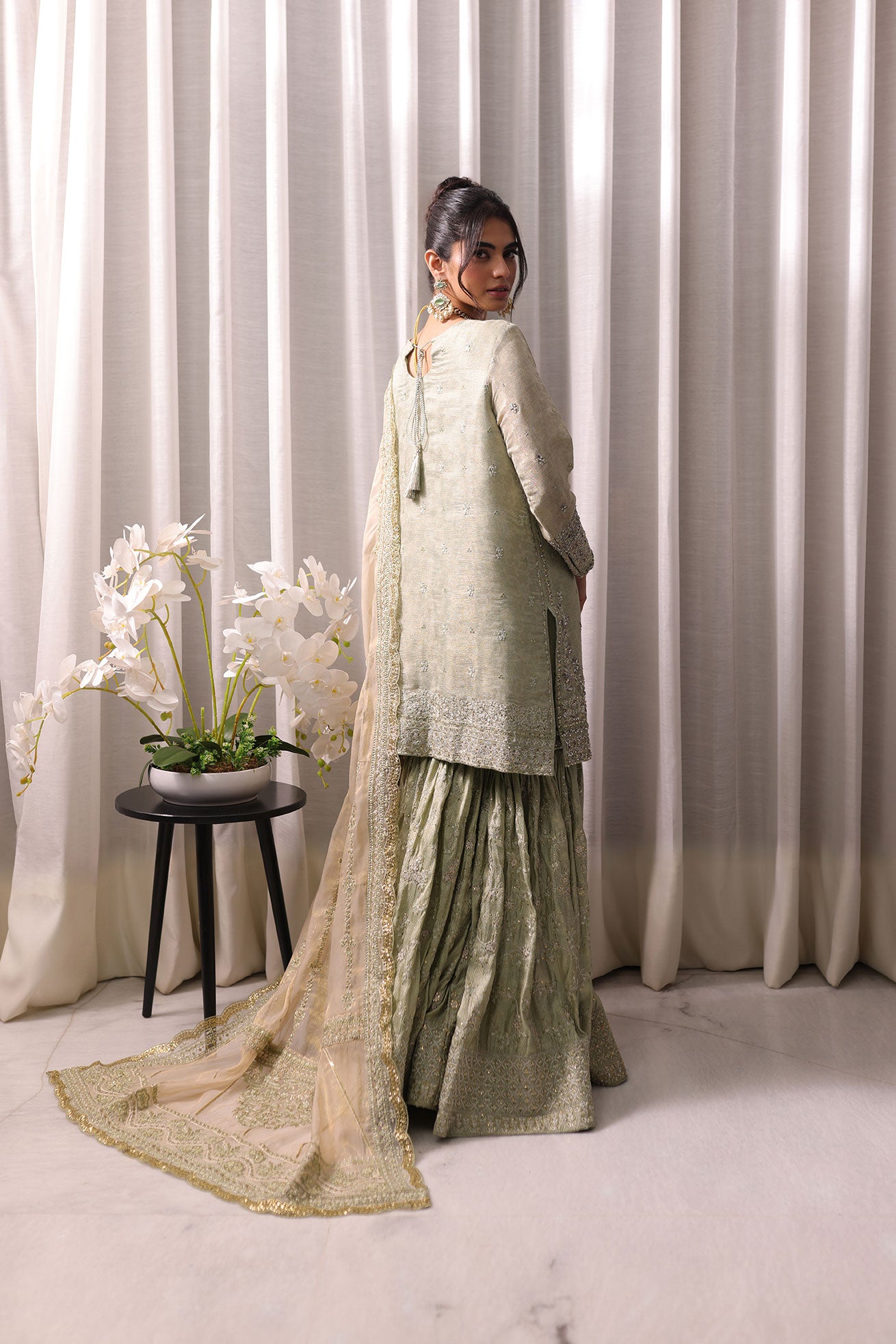 Delicate light green 3-piece formal wear with premium embroidery and matching trousers.