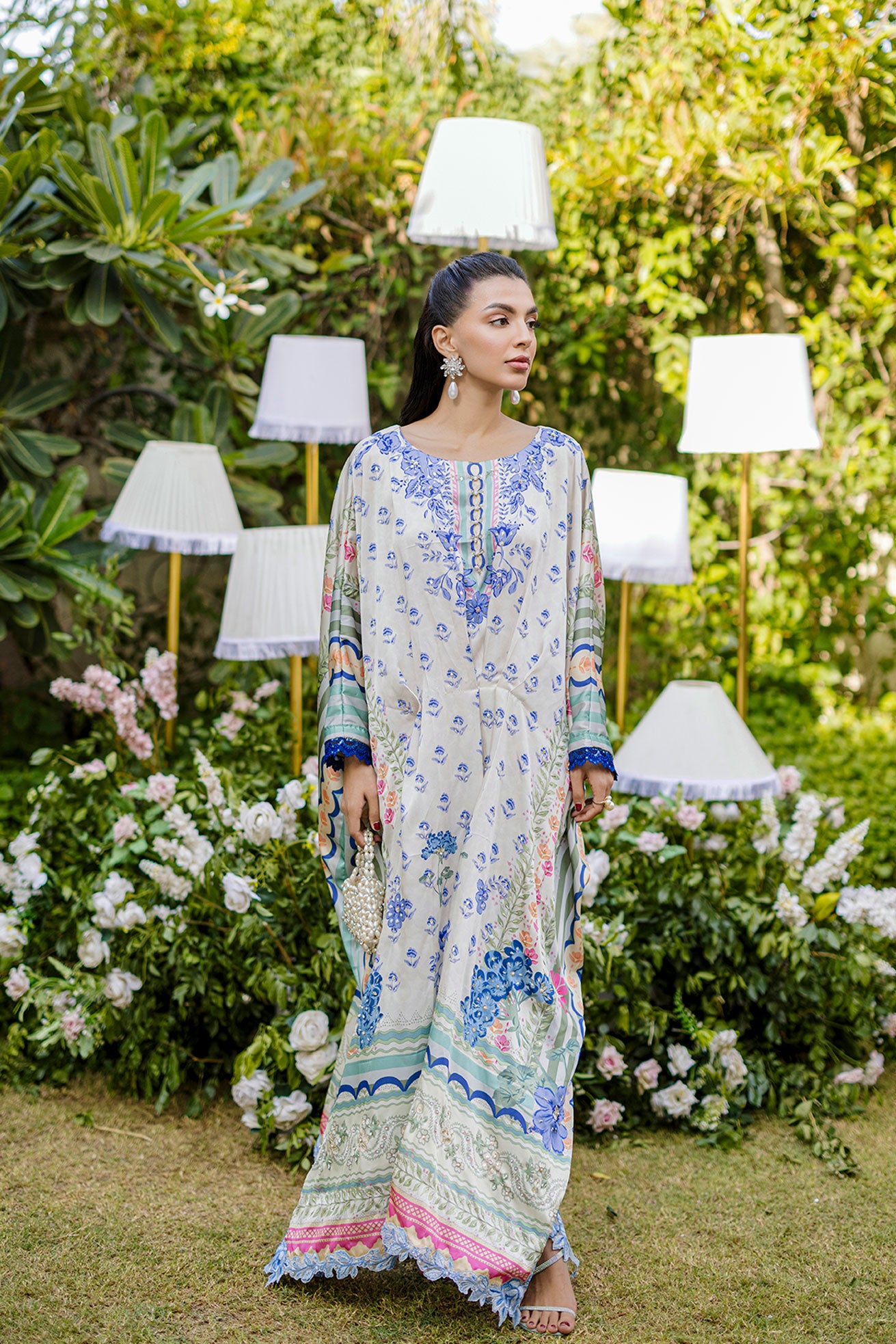 FW25DA-2869 Multi-colored hand-embellished silk kaftan featuring delicate floral patterns in hues of blue, green, and blush pink with a graceful, relaxed silhouette.