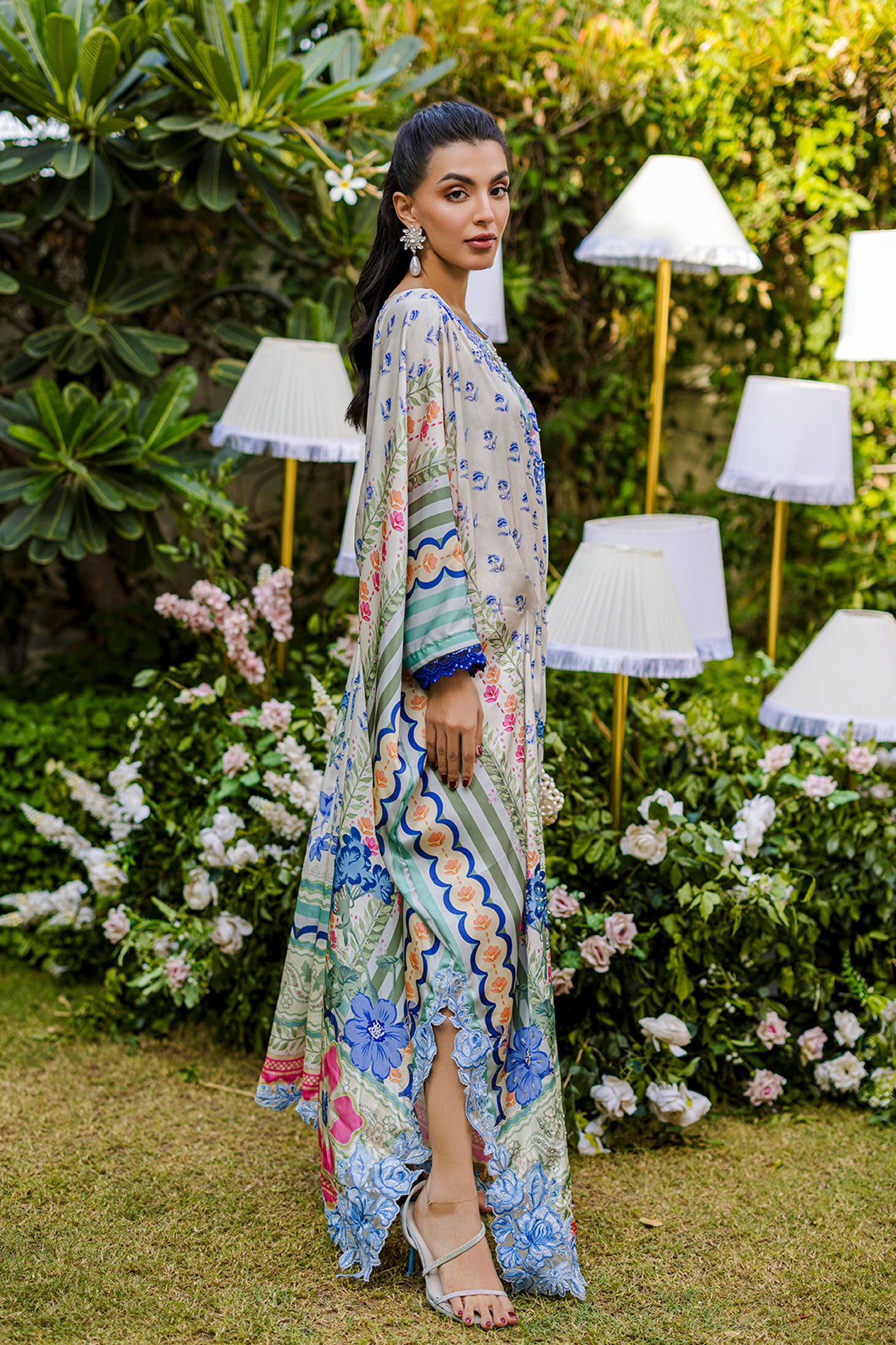 FW25DA-2869 Multi-colored hand-embellished silk kaftan featuring delicate floral patterns in hues of blue, green, and blush pink with a graceful, relaxed silhouette.