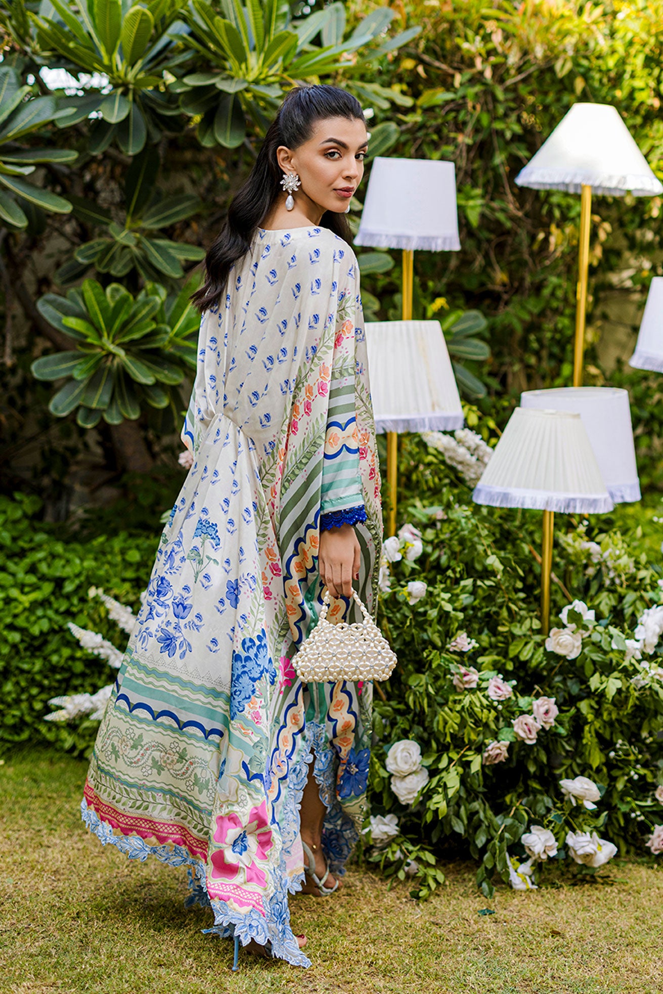 FW25DA-2869 Multi-colored hand-embellished silk kaftan featuring delicate floral patterns in hues of blue, green, and blush pink with a graceful, relaxed silhouette.
