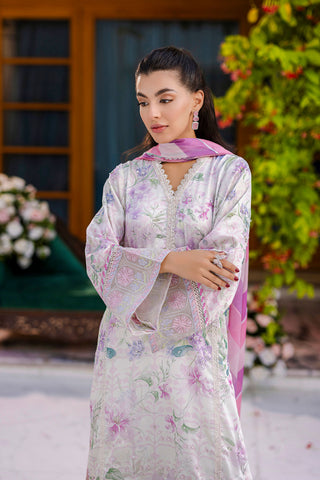 Off-white silk tunic blooming in lilac and blush tones with plain flared trousers and scalloped borders.