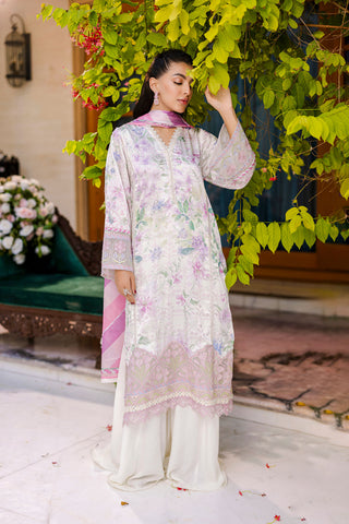 Off-white silk tunic blooming in lilac and blush tones with plain flared trousers and scalloped borders.