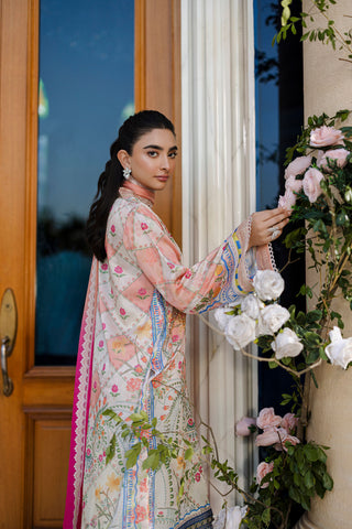 Ethereal orange silk creation with dainty floral embroidery across a checkered motif layout.