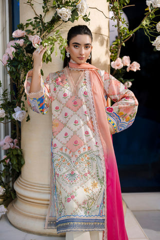 Ethereal orange silk creation with dainty floral embroidery across a checkered motif layout.