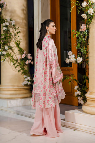 Feminine pink 2-piece silk tunic featuring blooming floral accents and matching flared solid trousers.