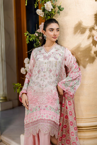 Feminine pink 2-piece silk tunic featuring blooming floral accents and matching flared solid trousers.