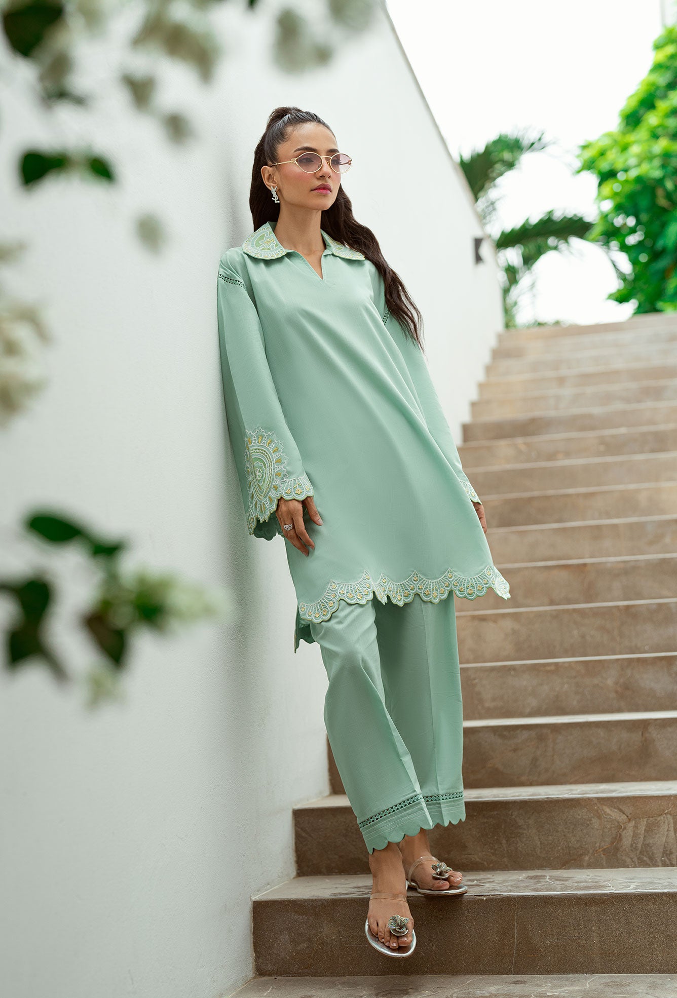 SS25DC-2569 Mint green 2-piece with intricate embroidery, cutwork hem, and scalloped pants.